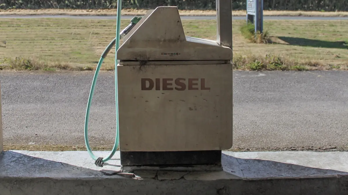 A weathered diesel pump at a roadside fuel station